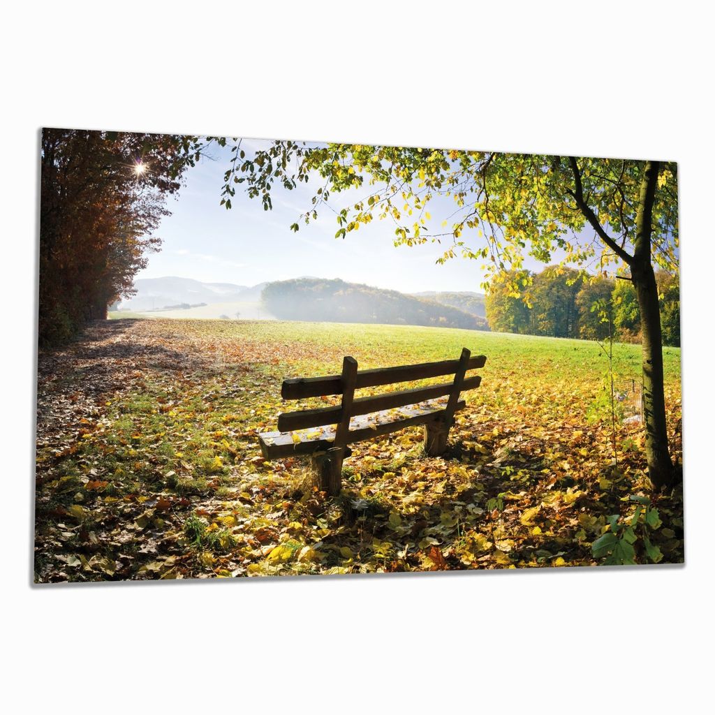 Wallario Herdabdeckplatte aus Glas, Größe 80 x 52 cm 1-teilig, Motiv Idyllische Holzbank in den Bergen