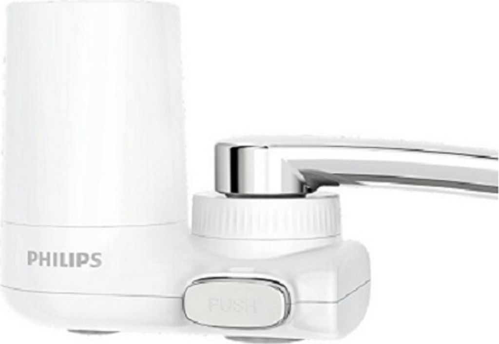 A white Philips water filter attached to a faucet.