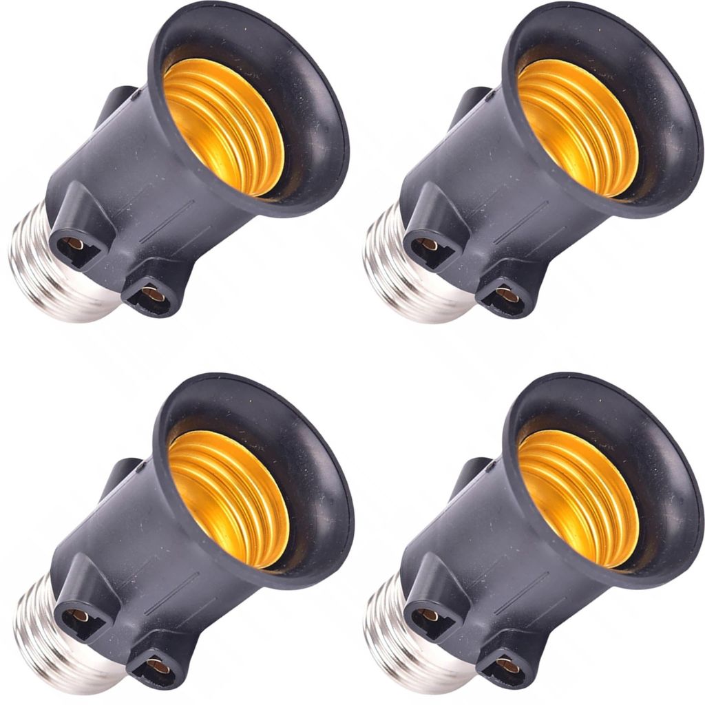Four black light bulb socket extenders with gold-colored interiors are arranged in a grid pattern against a white background.