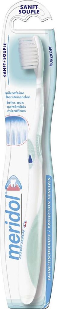 A packaged Meridol toothbrush.