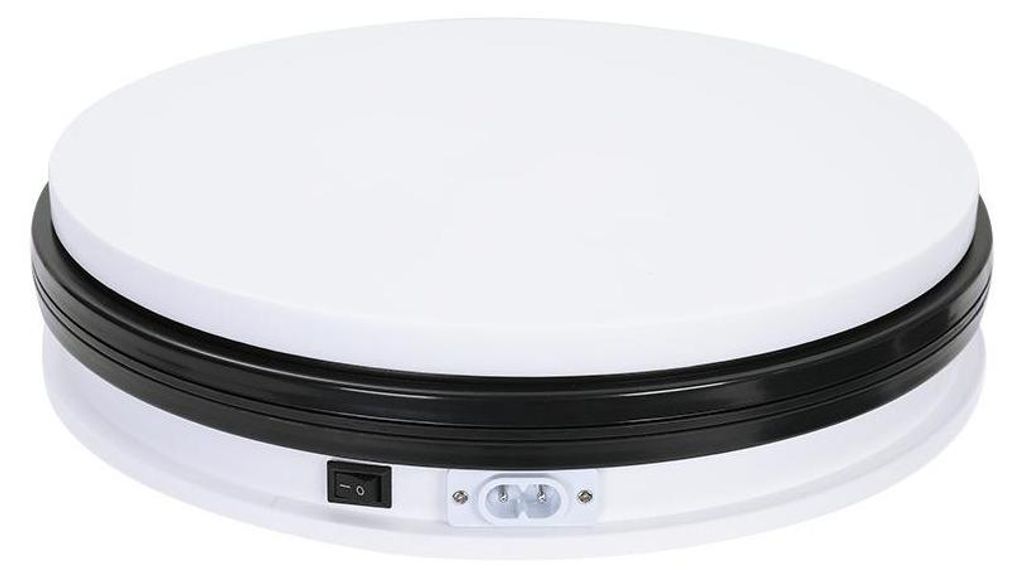 A white rotating display stand with a black rim and controls on the side.