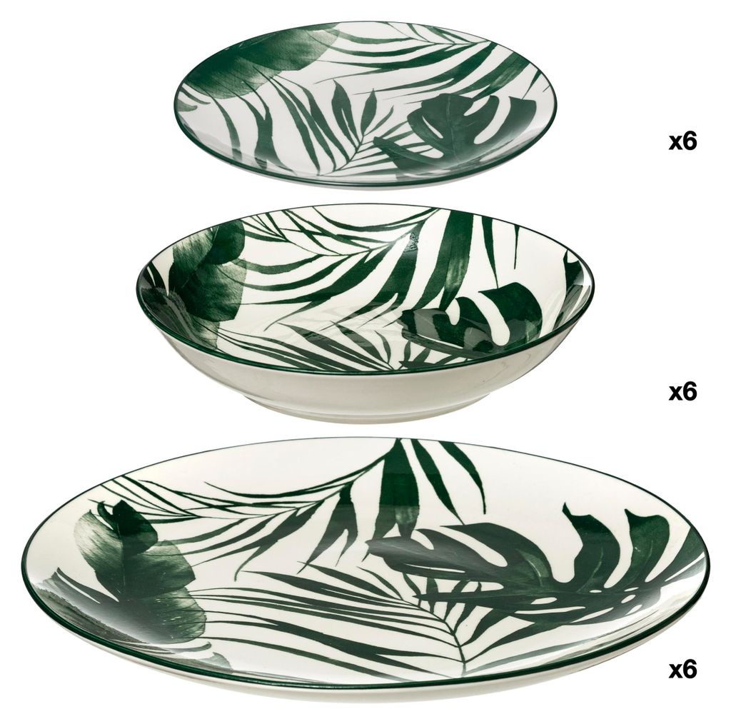 Three plates with a palm leaf pattern are stacked on a white background.