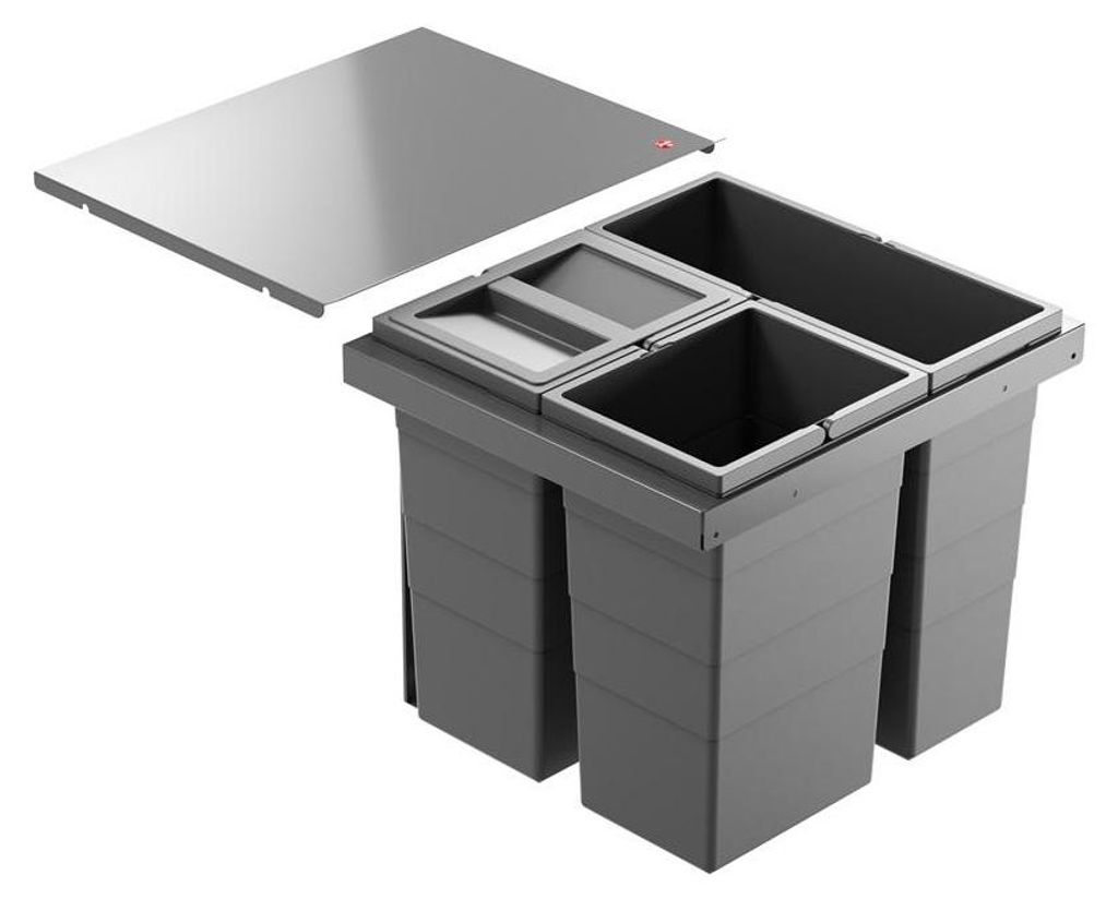 A multi-compartment waste bin system with a metal lid, shown from a diagonal angle.