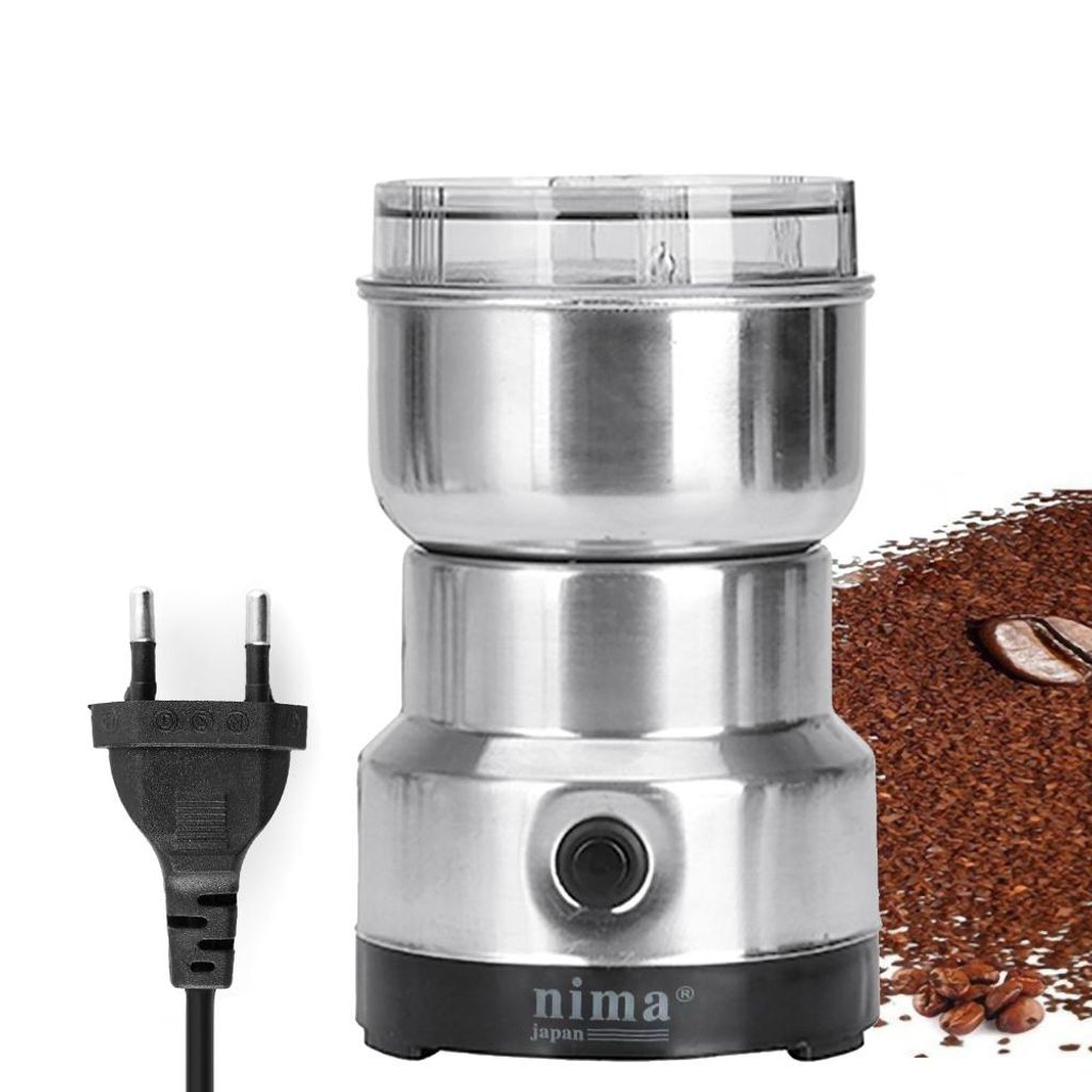 A coffee grinder with a plug and a pile of ground coffee with coffee beans.