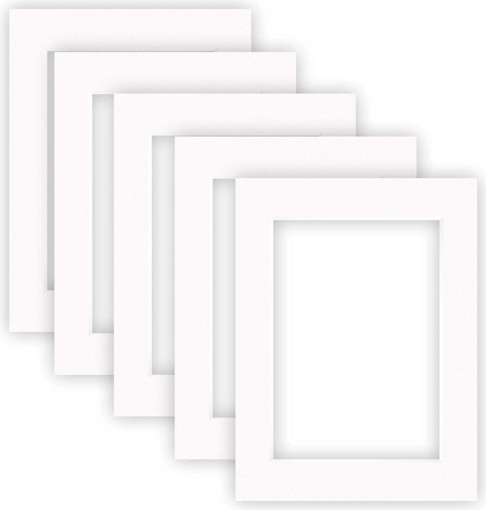 A stack of white picture frames on a white background.