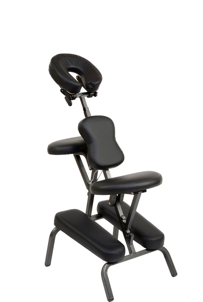 A black massage chair photographed in a studio setting.