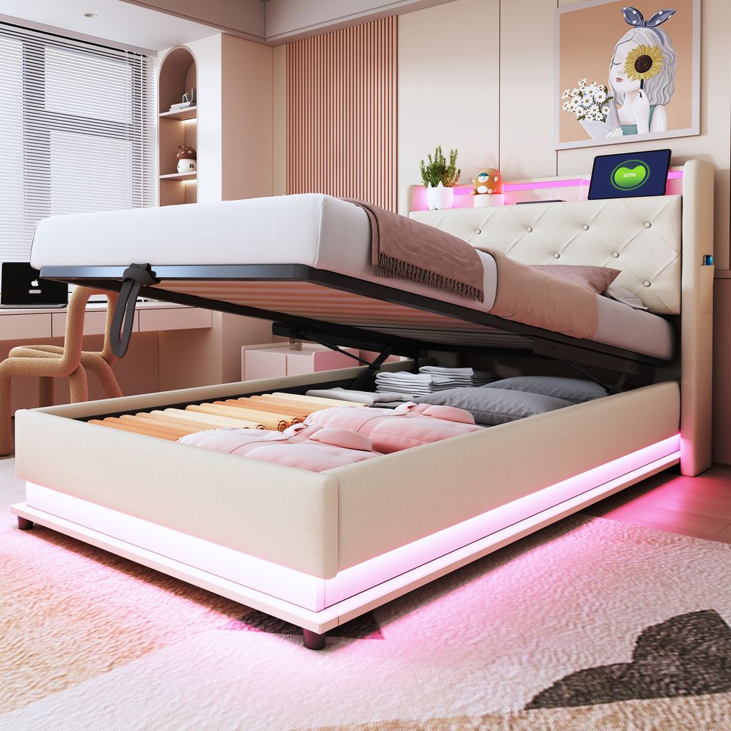 A bedroom setting with a bed that has its storage compartment open, revealing stored items. The bed has LED lighting around its base.