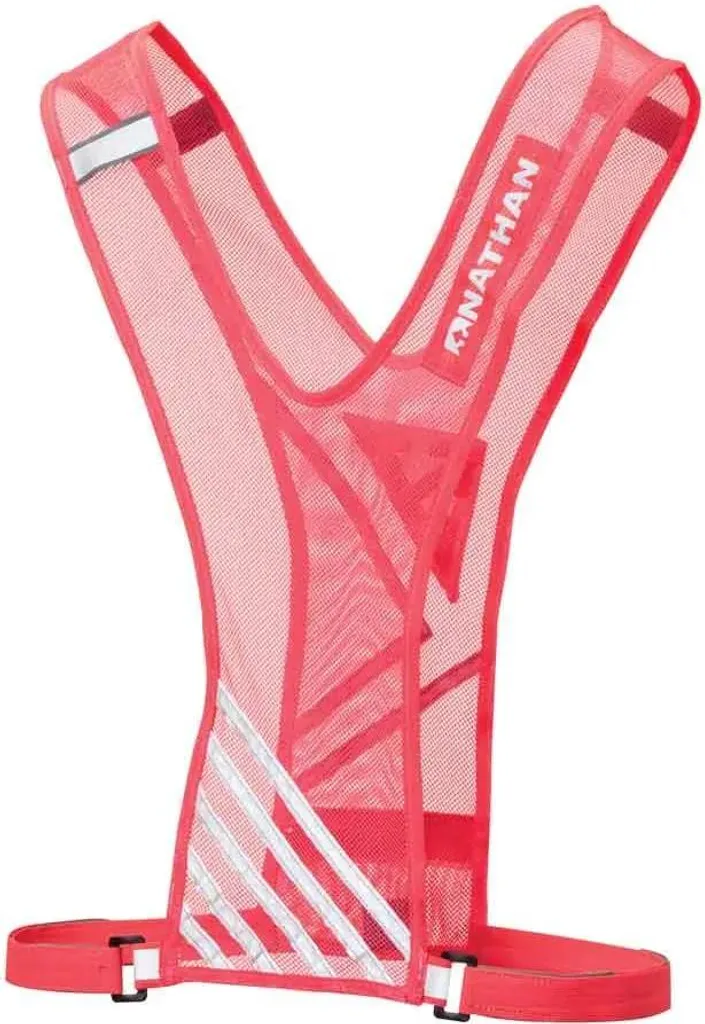 Courir de nuit en sécurité avec le gilet Nathan Bandolier Rose Homme