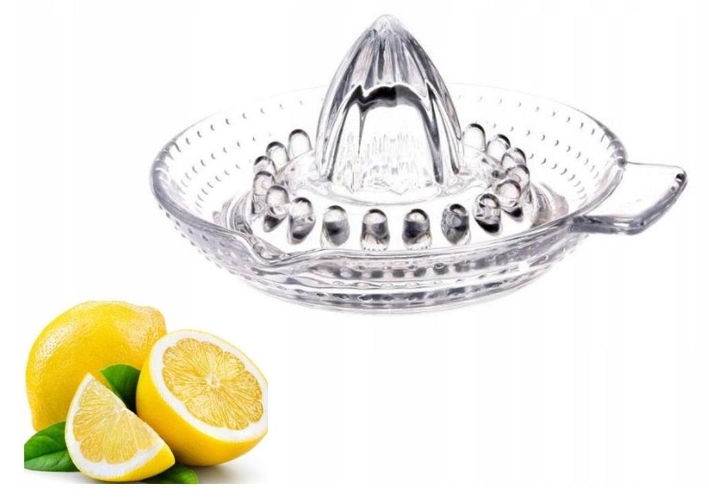 A clear glass citrus juicer with lemons next to it.