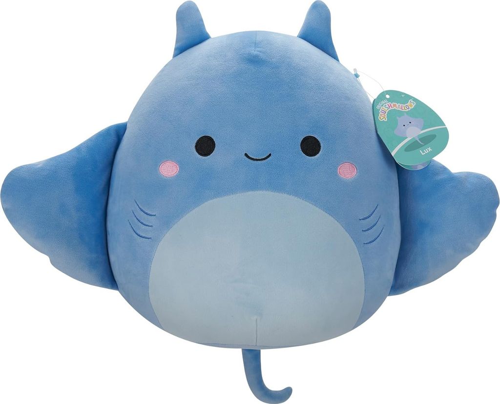 A blue manta ray plush toy with a tag.