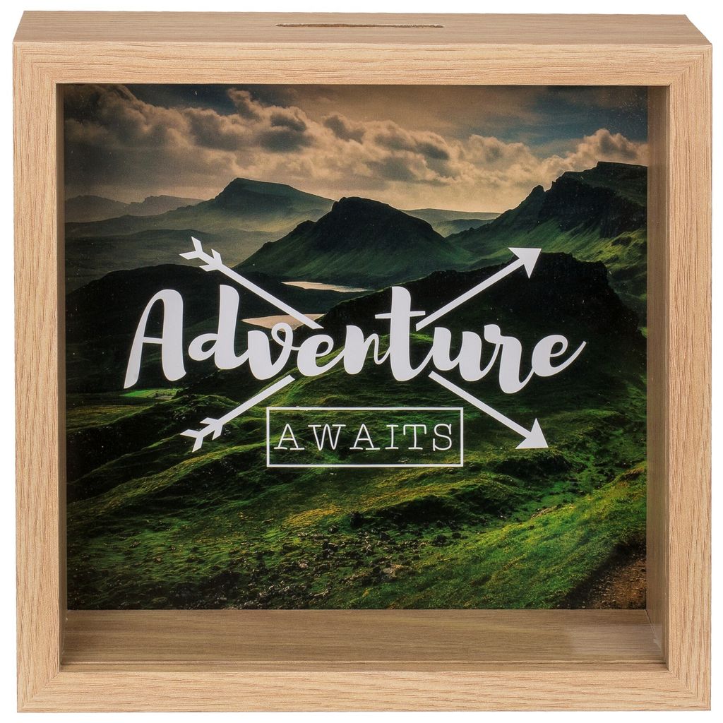 A wooden money box with a landscape image and the text "Adventure Awaits".