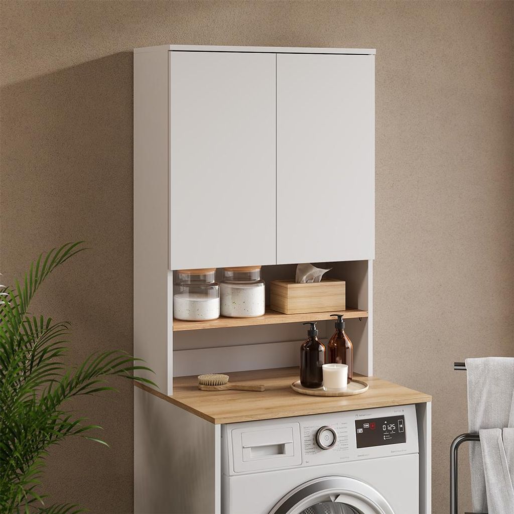 A washing machine cabinet with storage above it, placed on top of a washing machine.