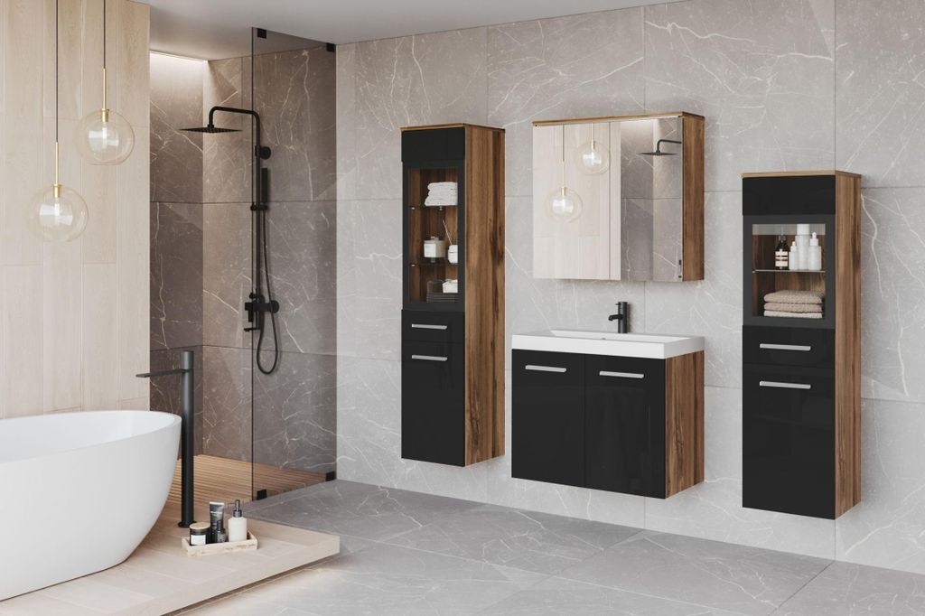 A modern bathroom with a bathtub, shower, and vanity set.