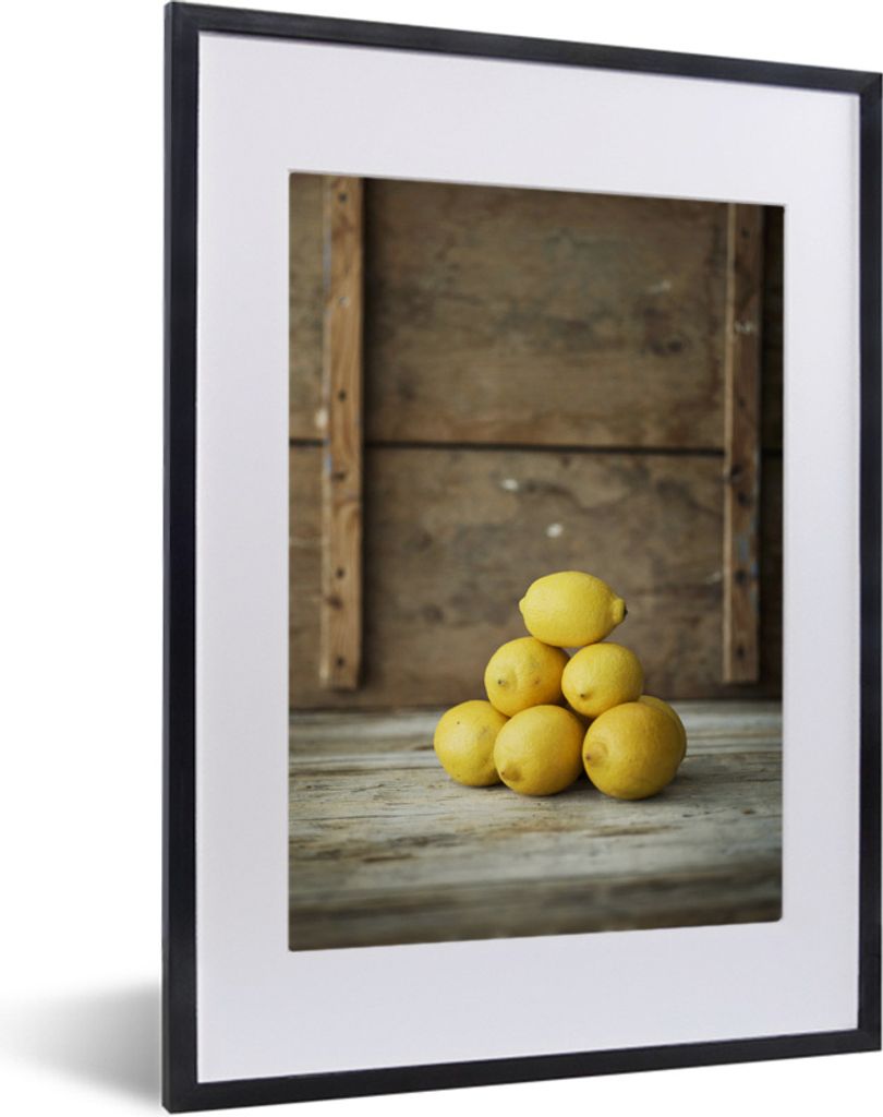 MuchoWow MuchoWow Gerahmtes Poster Stapel gelber Zitronen für einen rustikalen Sarg 30x40 cm - Poster mit zchwarzem Bilderrahmen - Wandposter ...