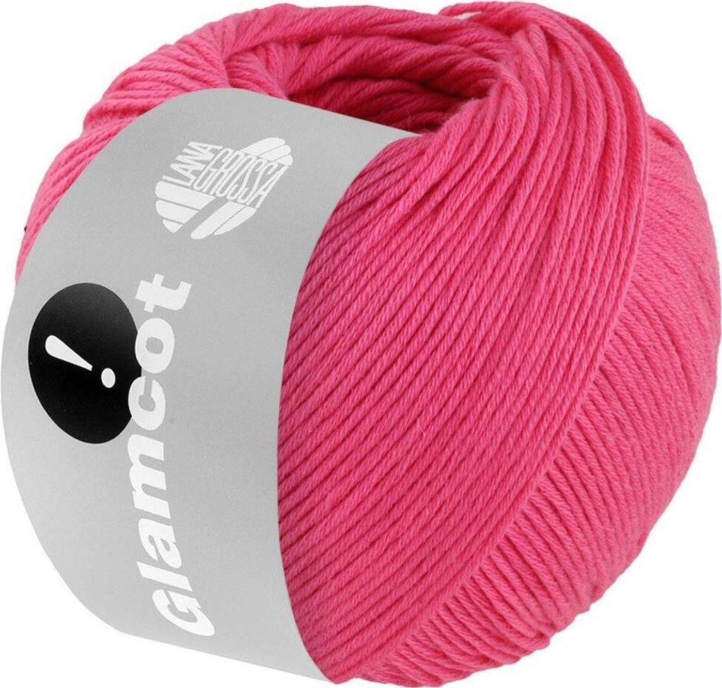 A ball of pink yarn with a label wrapped around it.