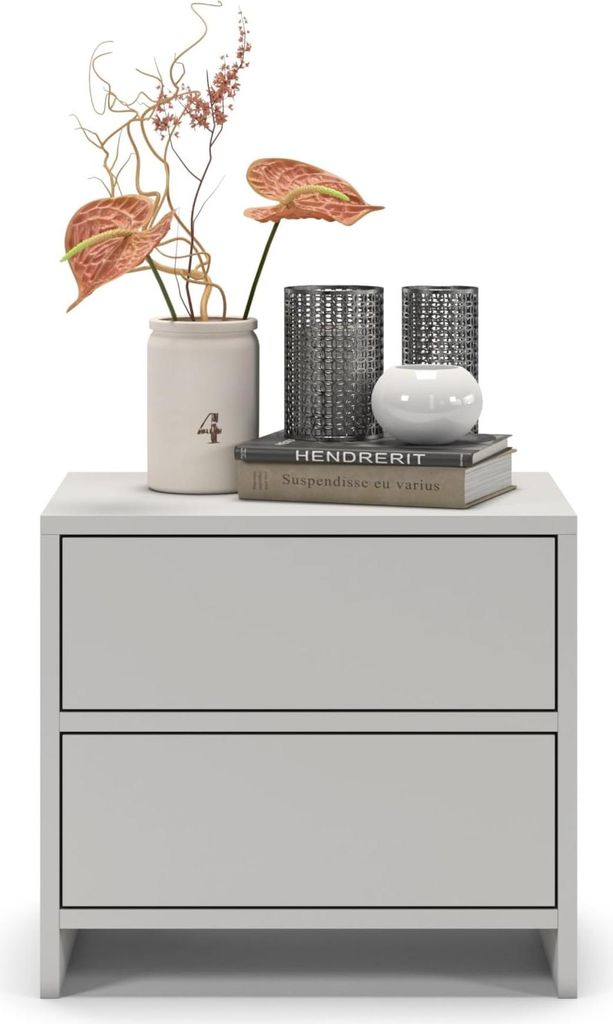 A nightstand with decorative items on top.