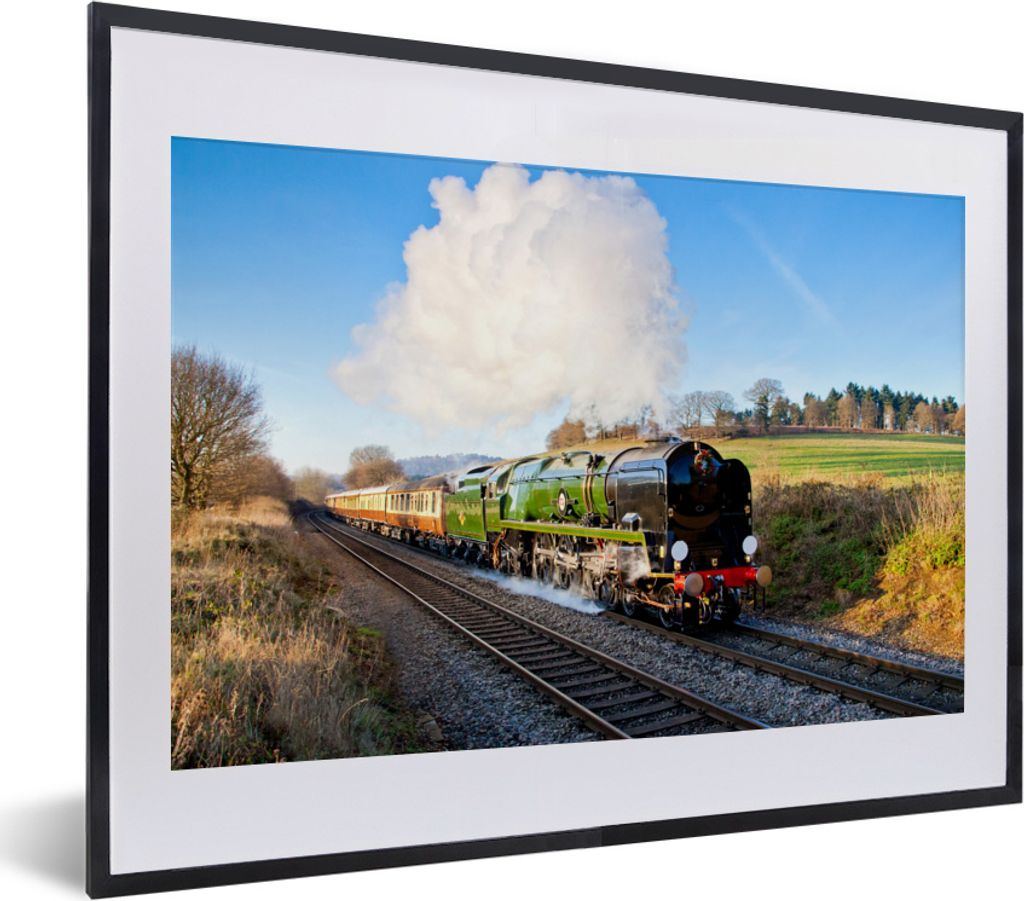 MuchoWow MuchoWow Gerahmtes Poster Ein bunter Dampfzug in einer grünen Landschaft 40x30 cm - Poster mit zchwarzem Bilderrahmen - Bilderrahmen ...
