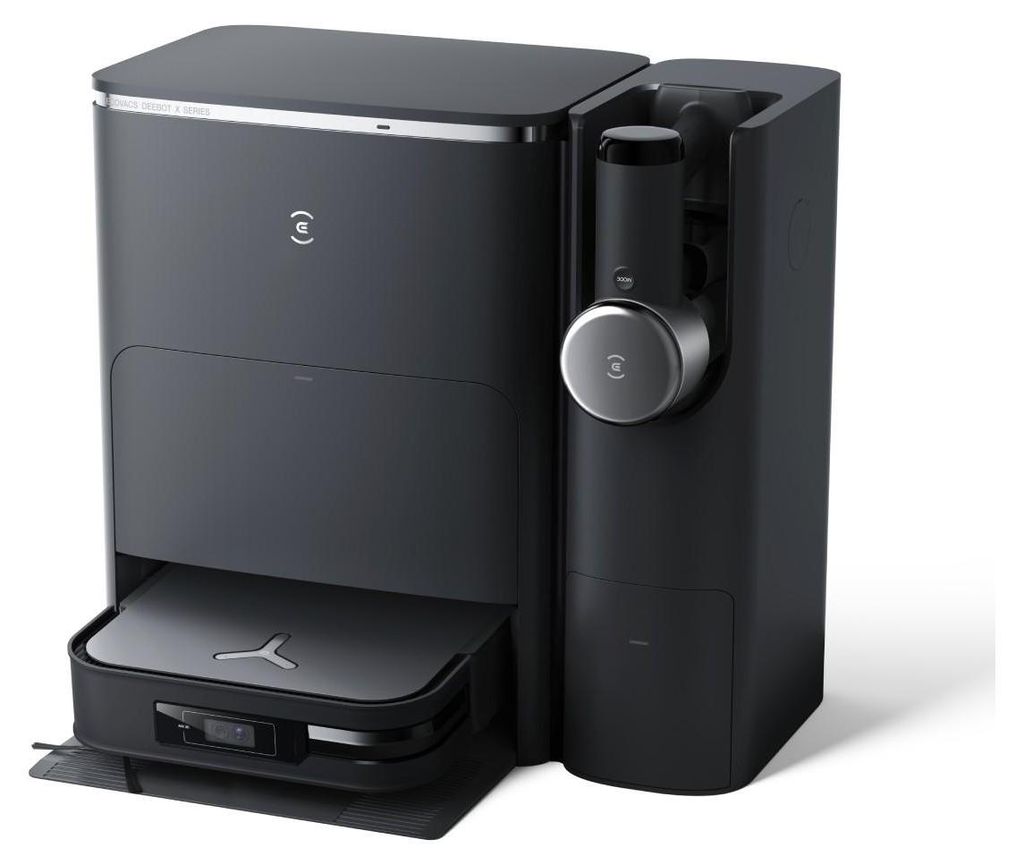 A studio shot of a black robot vacuum cleaner and its docking station.