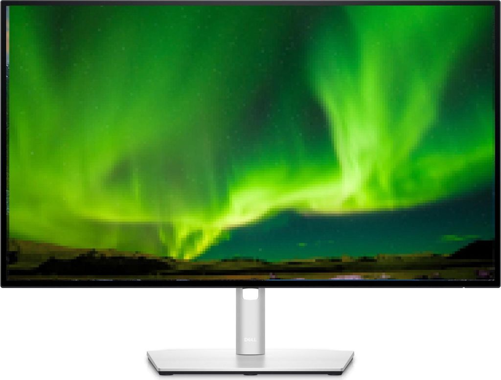 A computer monitor displaying a vibrant aurora borealis scene.