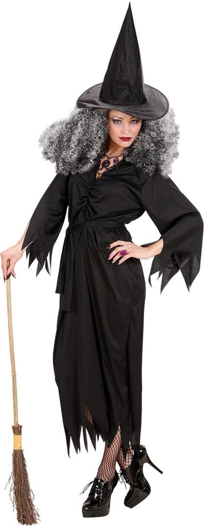 A woman dressed as a witch, holding a broomstick.