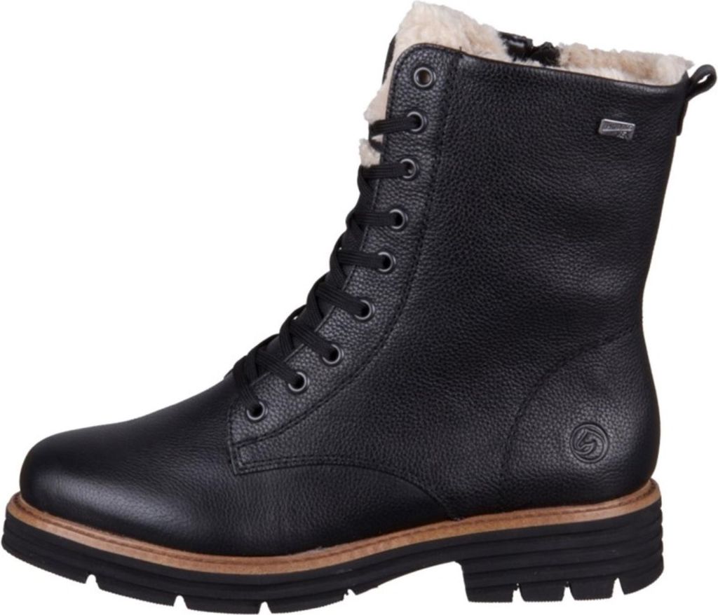 A black leather boot with fur lining.