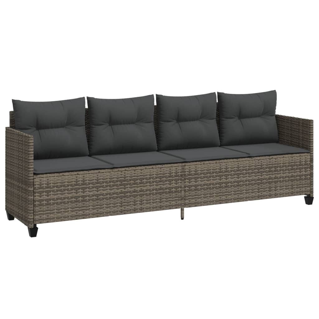A long, four-seater outdoor sofa made of woven rattan with dark gray cushions, shown against a white background.