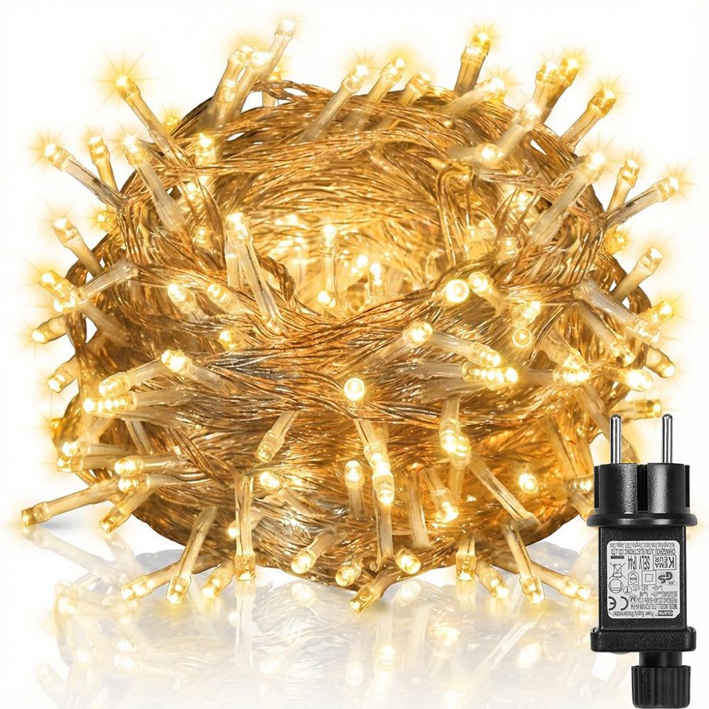 A coiled string of warm white LED lights with a black power adapter.