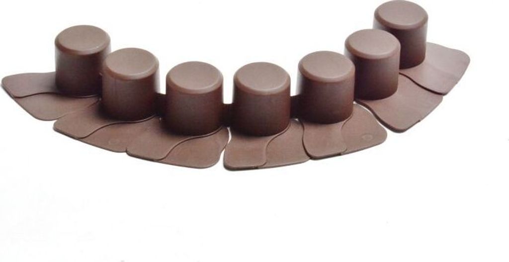 A row of brown garden edging pieces on a white background.