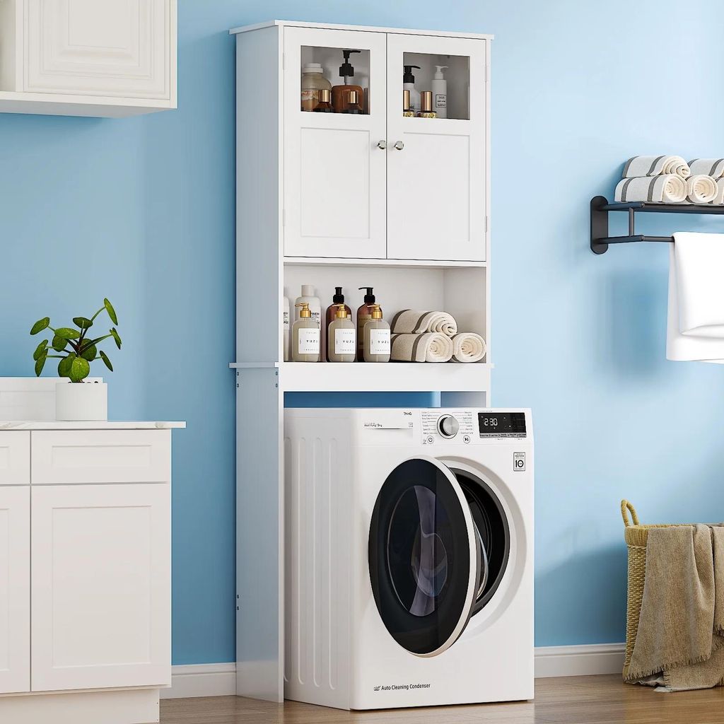 A white cabinet unit is placed over a washing machine in a laundry room setting.