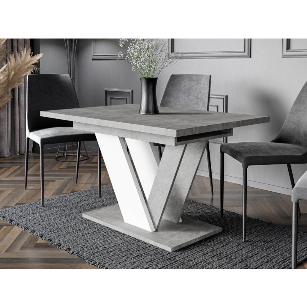 A dining table with chairs in a modern dining room setting.