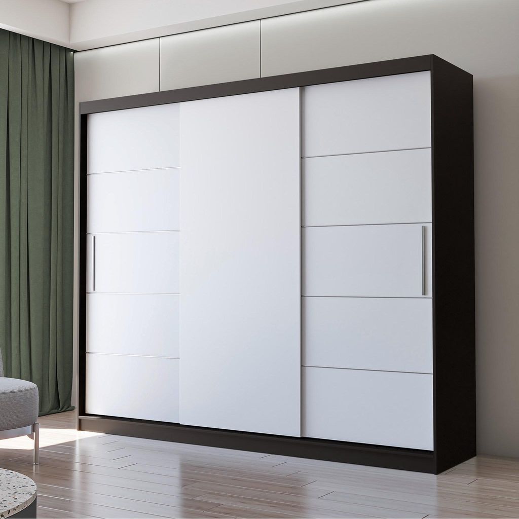 A modern wardrobe with sliding doors in a bedroom setting.