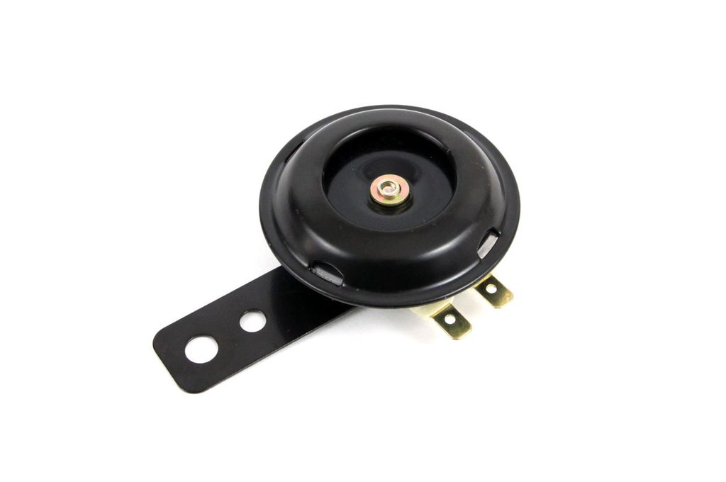 A black electric horn with a metal mounting bracket and two gold terminals, isolated on a white background.