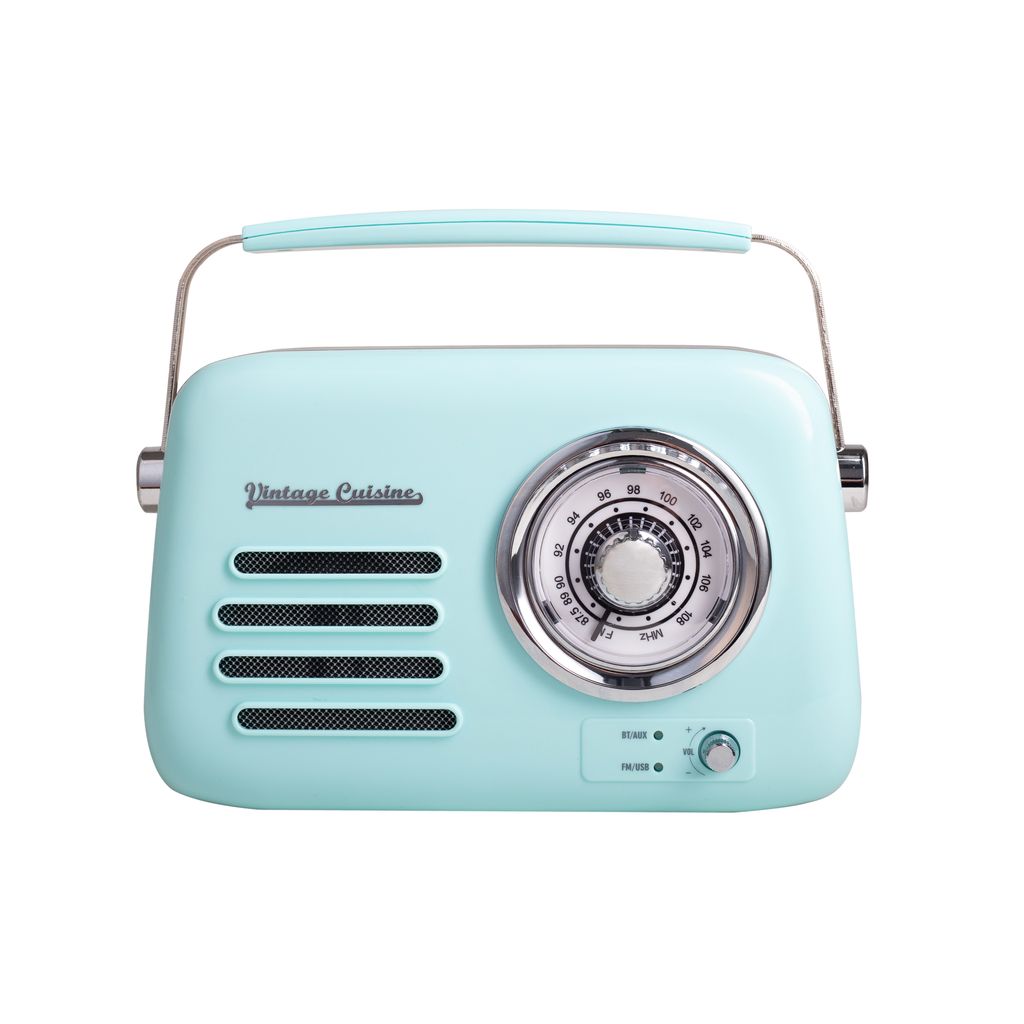 A mint-colored vintage-style radio with a silver dial and handle, presented on a white background.
