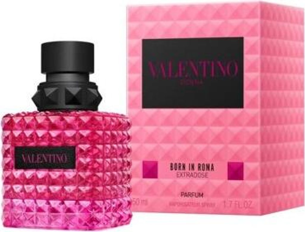 A bottle of Valentino Donna Born In Roma Extradose Eau de Parfum and its pink packaging are displayed against a white background.