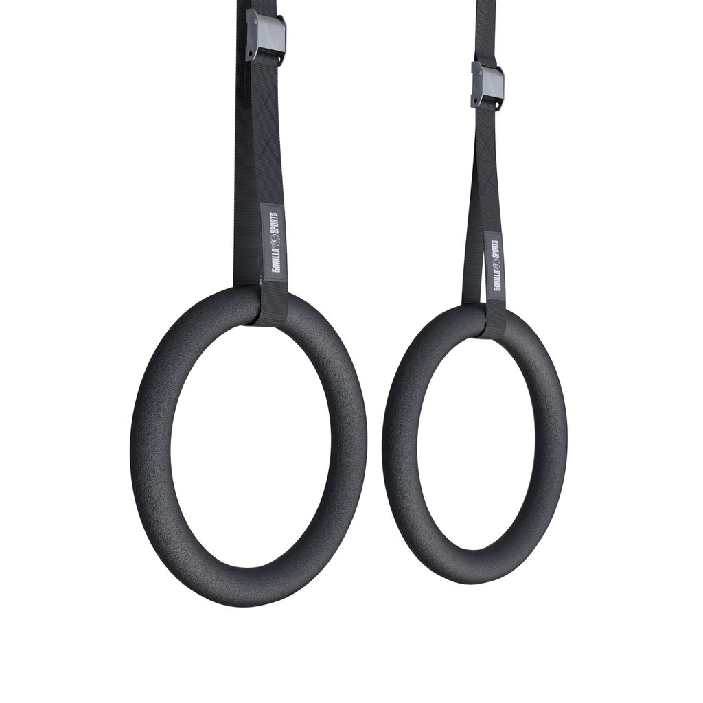 Two gymnastic rings hanging from straps against a white background.