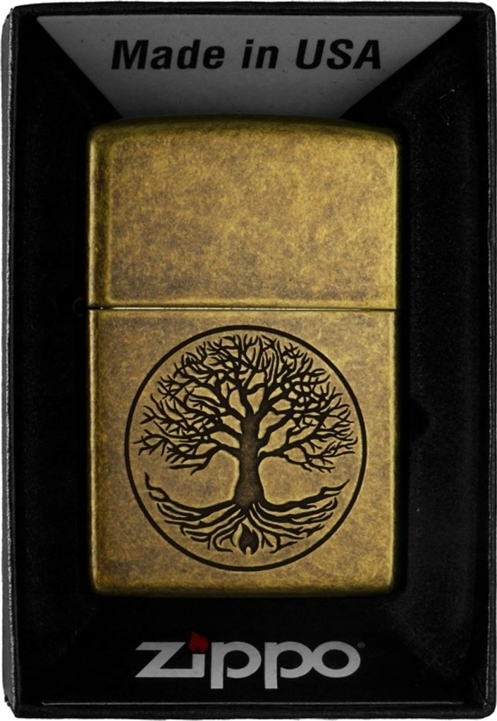 A Zippo lighter with a tree of life design, presented in its packaging.
