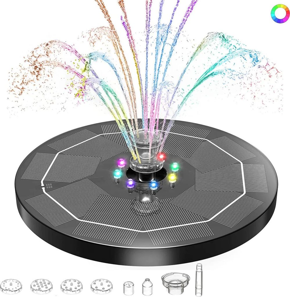 A solar-powered fountain with LED lights spraying colorful water.