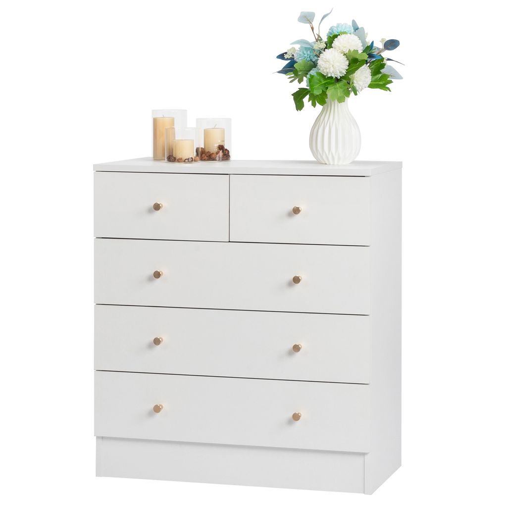 A white dresser with decorative items on top.