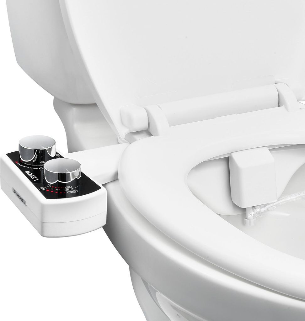 A bidet attachment is installed on a toilet seat.
