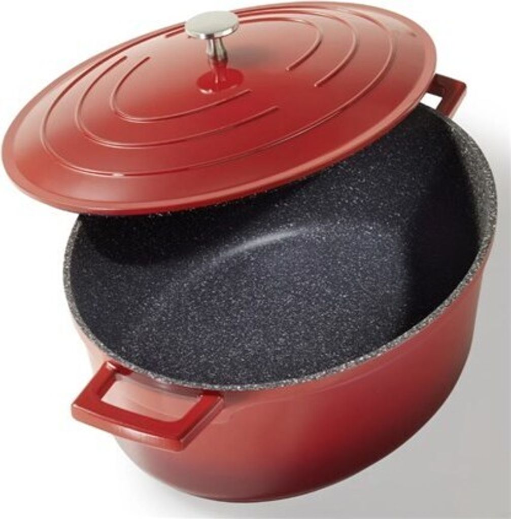 A red oval cast iron pot with a speckled black interior and a partially open lid.