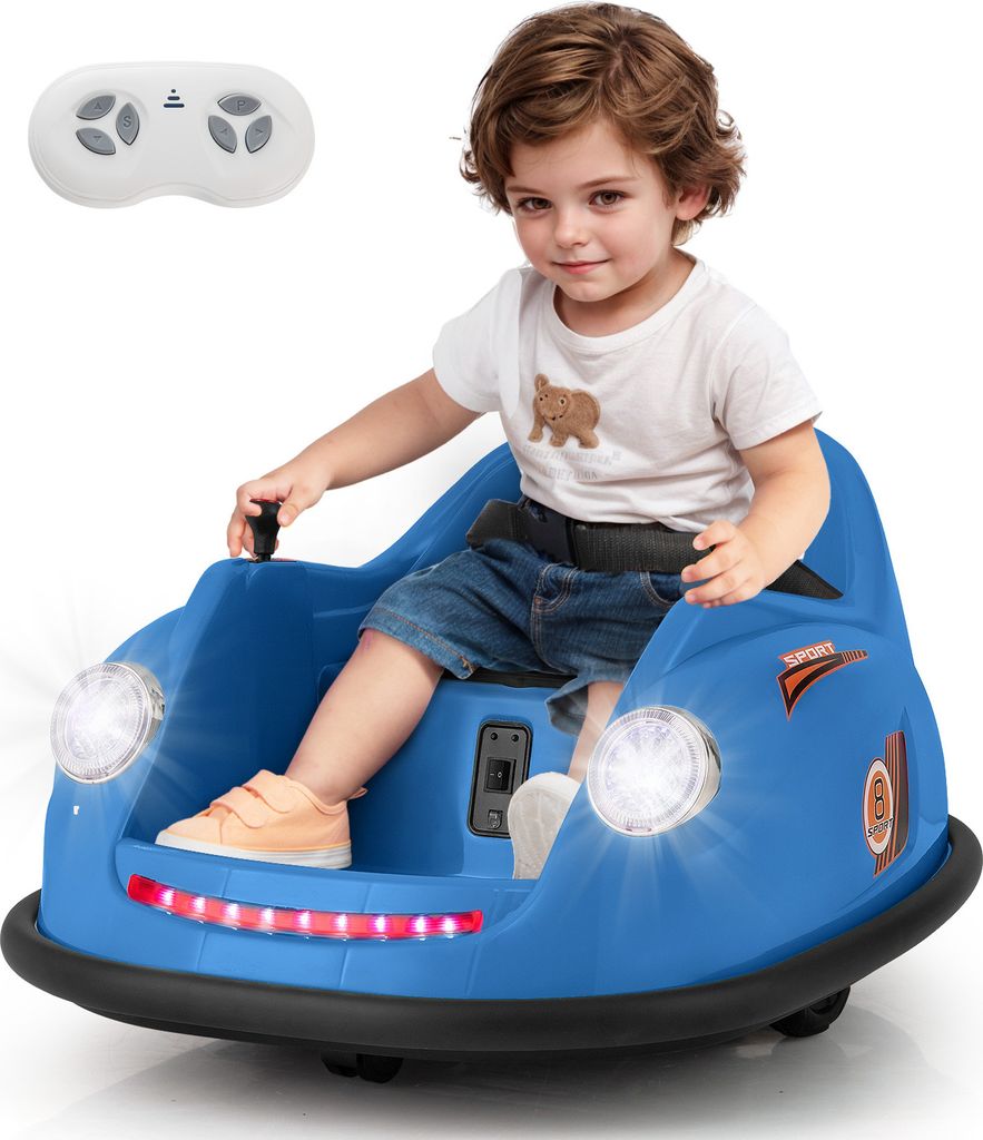 A young child is sitting in a blue electric bumper car, holding the steering wheel.