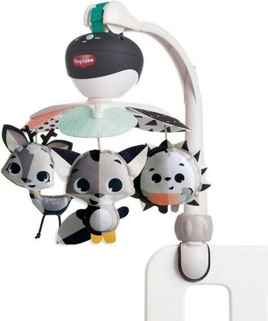 A baby mobile with stuffed animal toys attached to a stand, clipped onto the side of a crib.