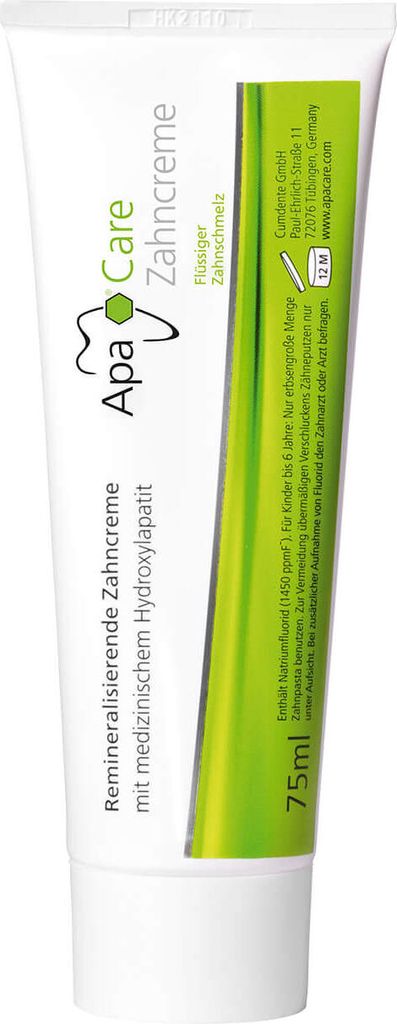 A tube of toothpaste on a white background with a green gradient design on the side.