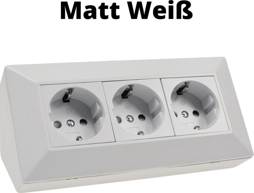 A white triple electrical socket outlet mounted on a surface.