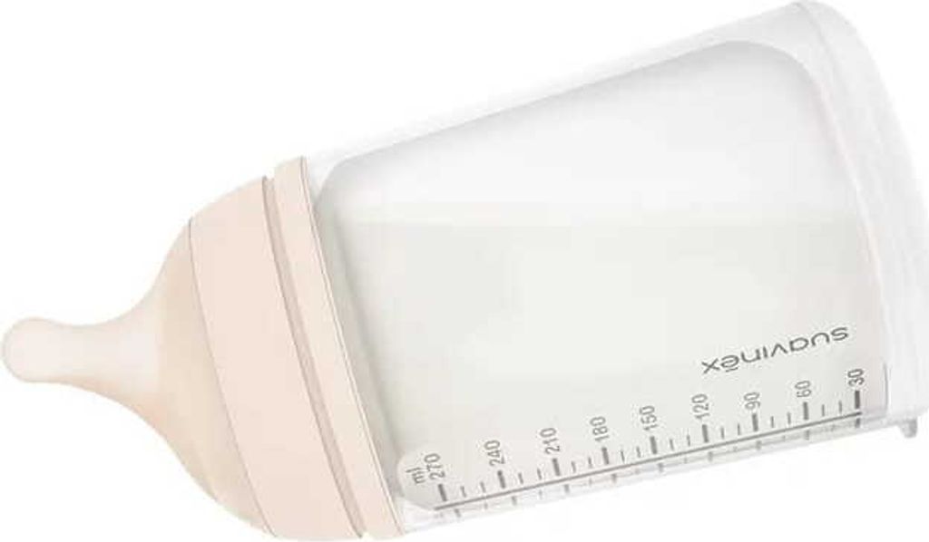 A baby bottle filled with milk, tilted on a white background.