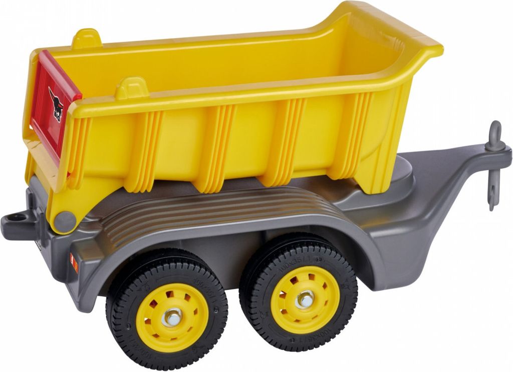 A toy dump truck trailer with a yellow dump bed and gray chassis, shown from a side-angle.
