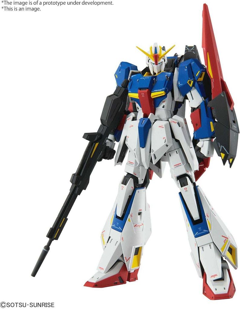 A detailed studio shot of a white, blue, red, and black robot model with a large red fin on its back and a black rifle in its left hand, set against a plain white background.