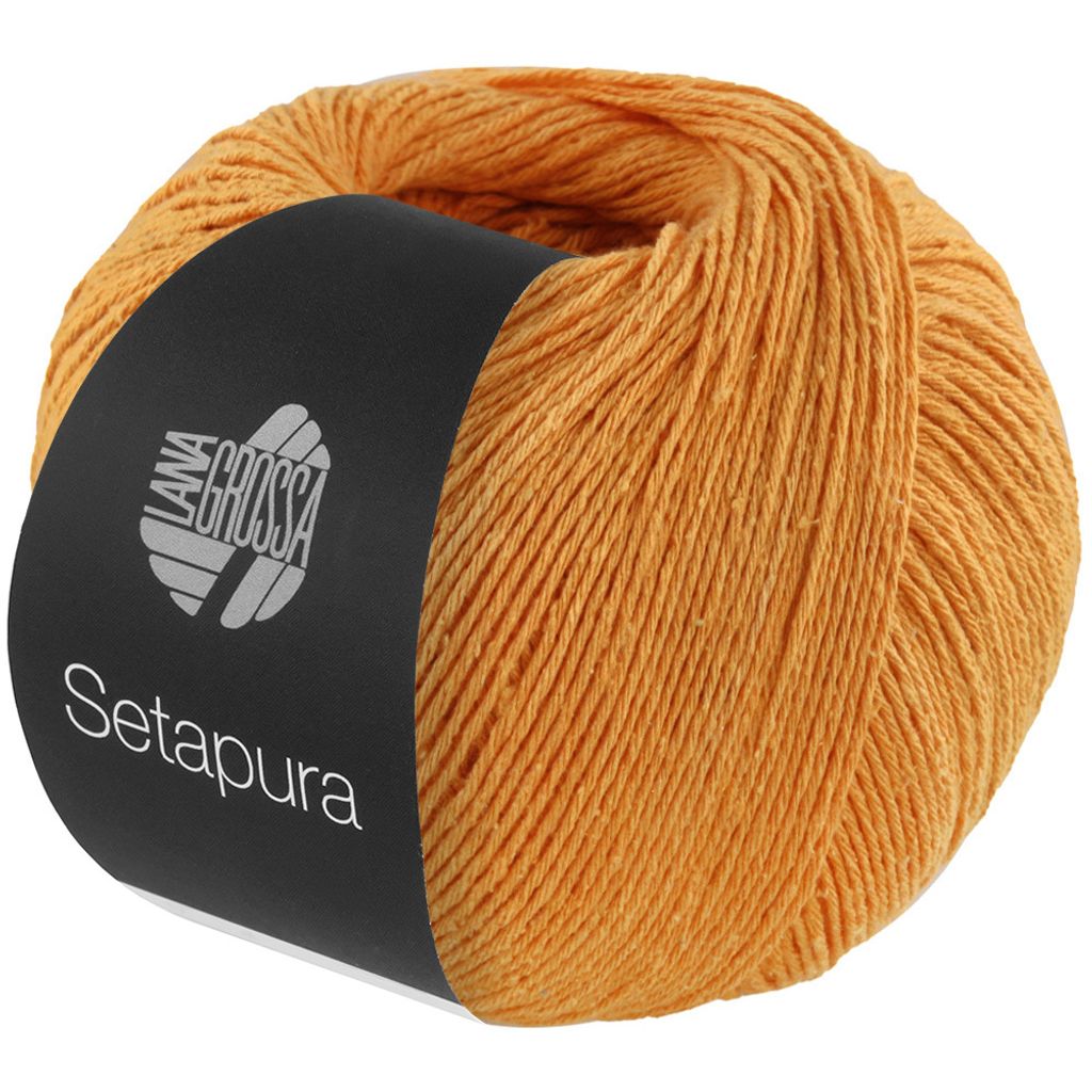 A ball of orange yarn with a black label.