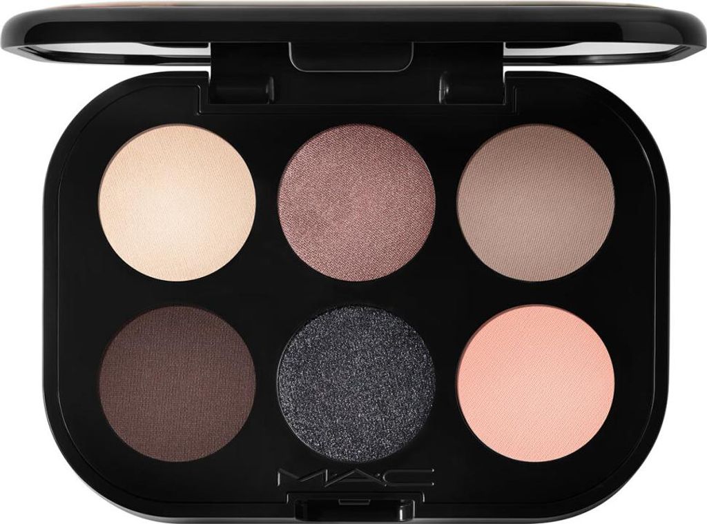 A top-down view of an open eyeshadow palette with six circular pans of eyeshadow.