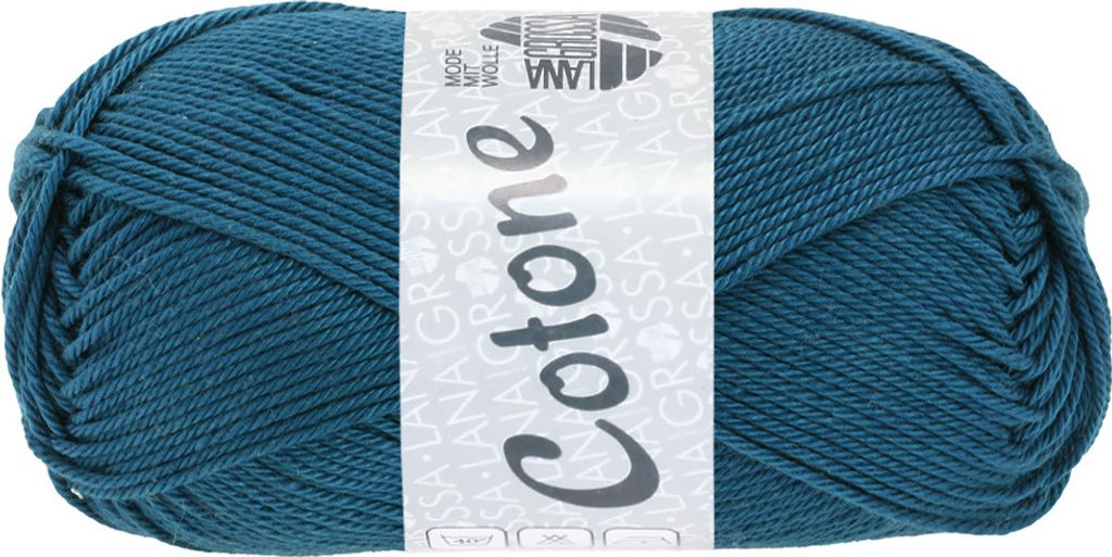 A ball of teal yarn with a label.